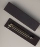 front and back of the magnetic needle minder